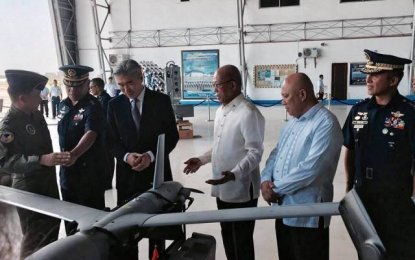 <p>Defense Secretary Delfin Lorenzana and US Ambassador to the Philippine Sung Kim lead the turnover of the six ScanEagle unmanned aerial vehicles (UAVs) acquired by the Philippine Air Force on Tuesday (March 13, 2018). <em>(Photo courtesy: Eunice Samonte, PTV)</em></p>